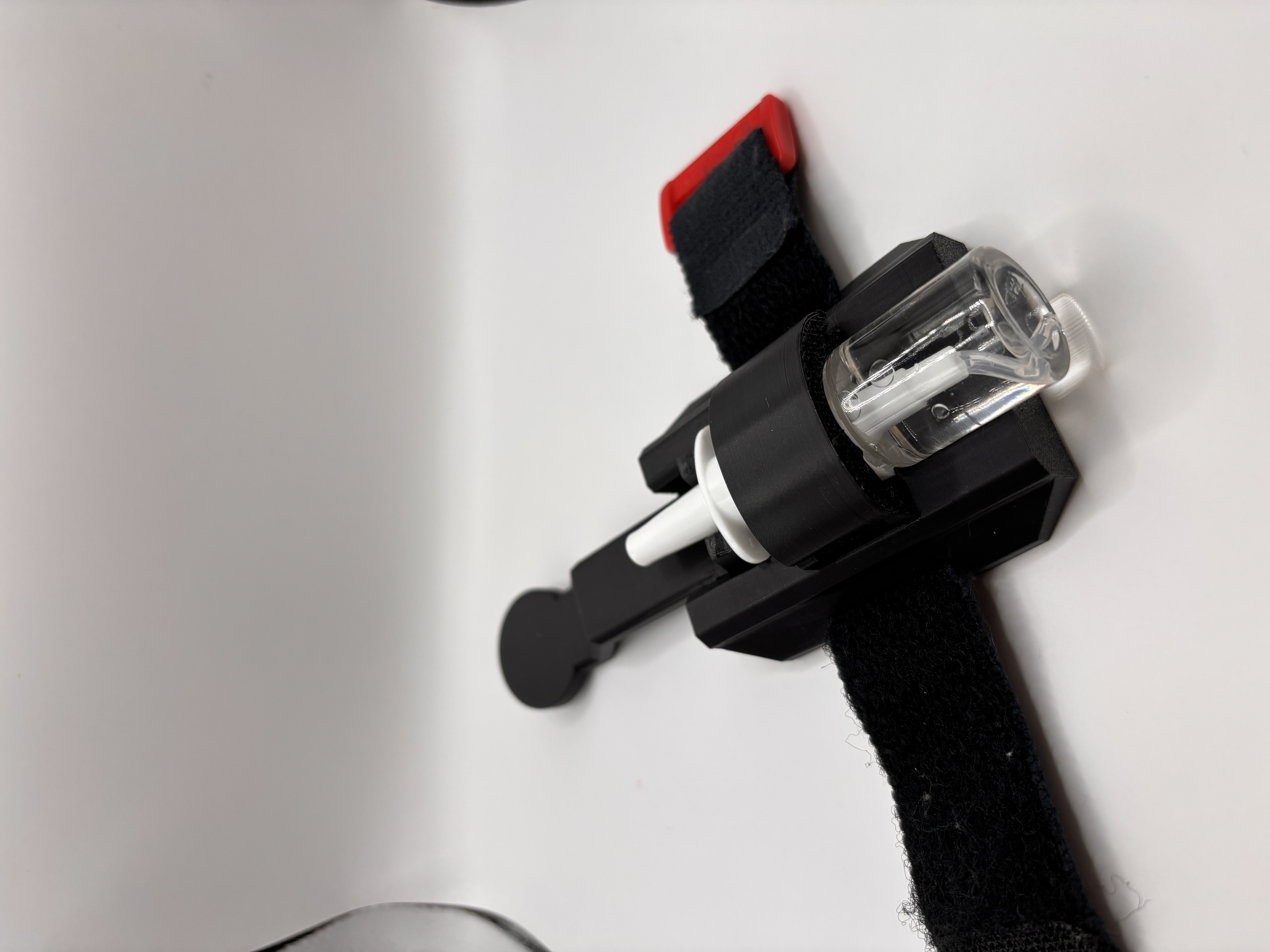 Side angle of Web Shooter with spray bottle